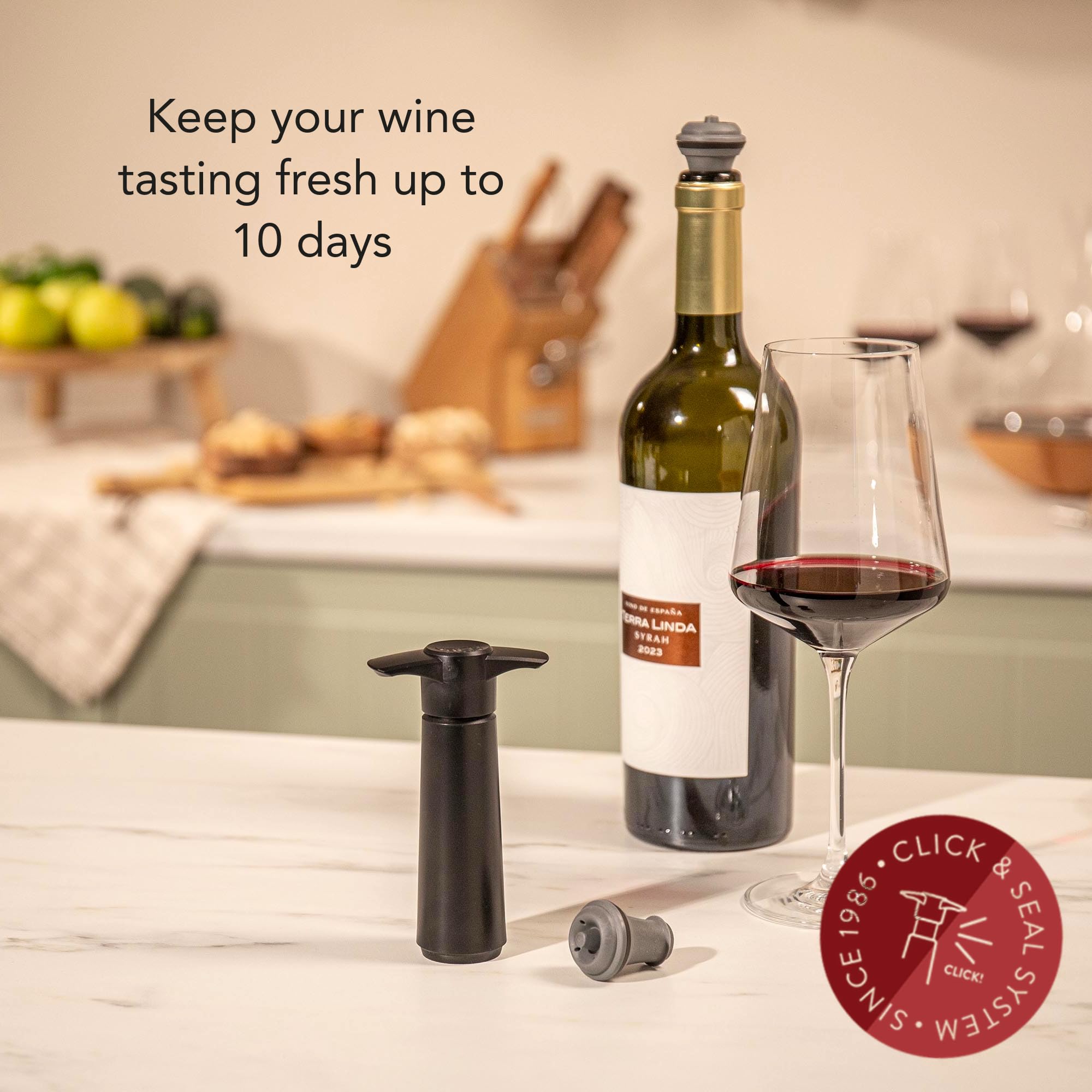 Vacu Vin manual pump action shown for easy air removal.