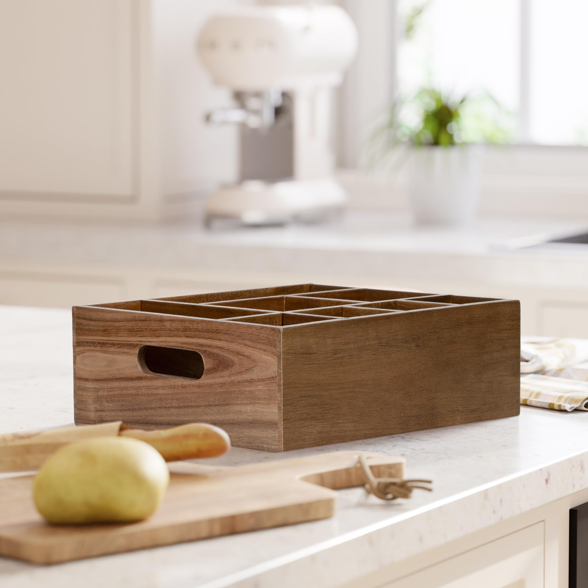 VaeFae Acacia wood caddy neatly stores spoons, forks, and plates.