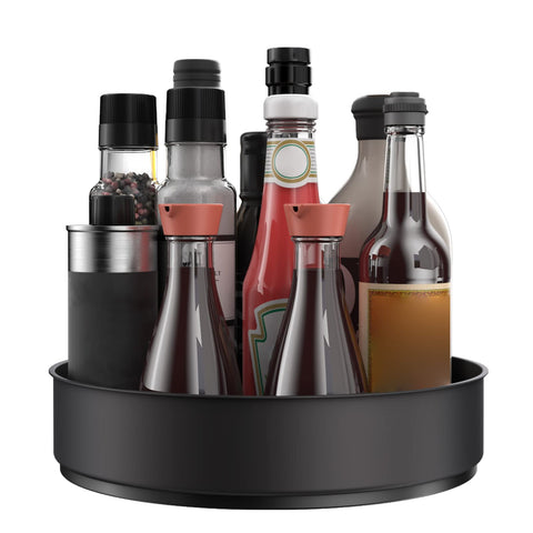 VAEHOLD Lazy Susan in rotation mode for easy access to spices and bottles.