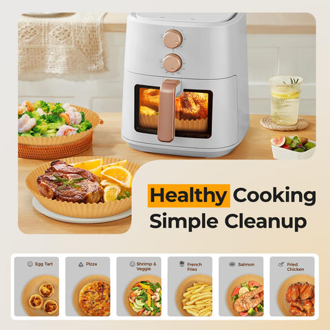 Vailnd oil-proof parchment liners protect the air fryer interior from spills.