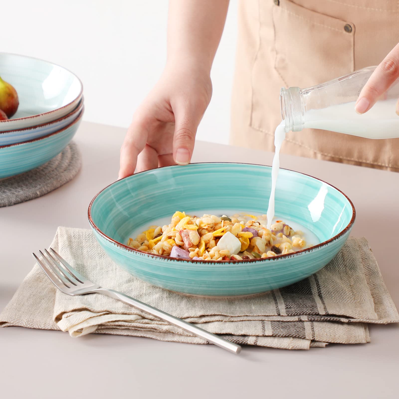 Vancasso Bonita bowls shown during dishwasher safe cleanup after dinner