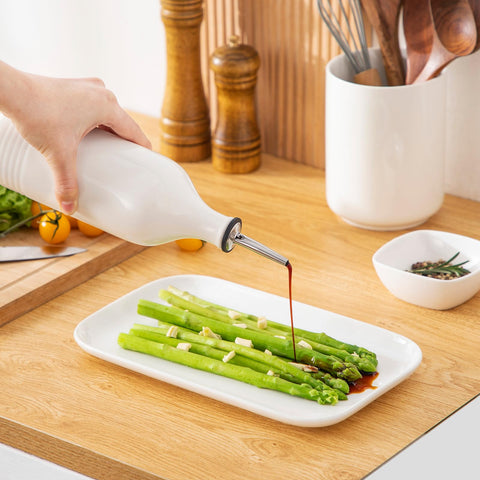 Vancasso ceramic oil dispenser on a stylish kitchen table display.