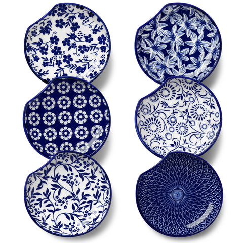 Vancasso ceramic spoon rest on stovetop with blue floral design keeps counters tidy