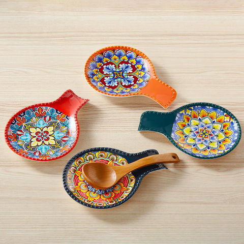 Vancasso orange spoon rest doubles as a decorative kitchen accent.