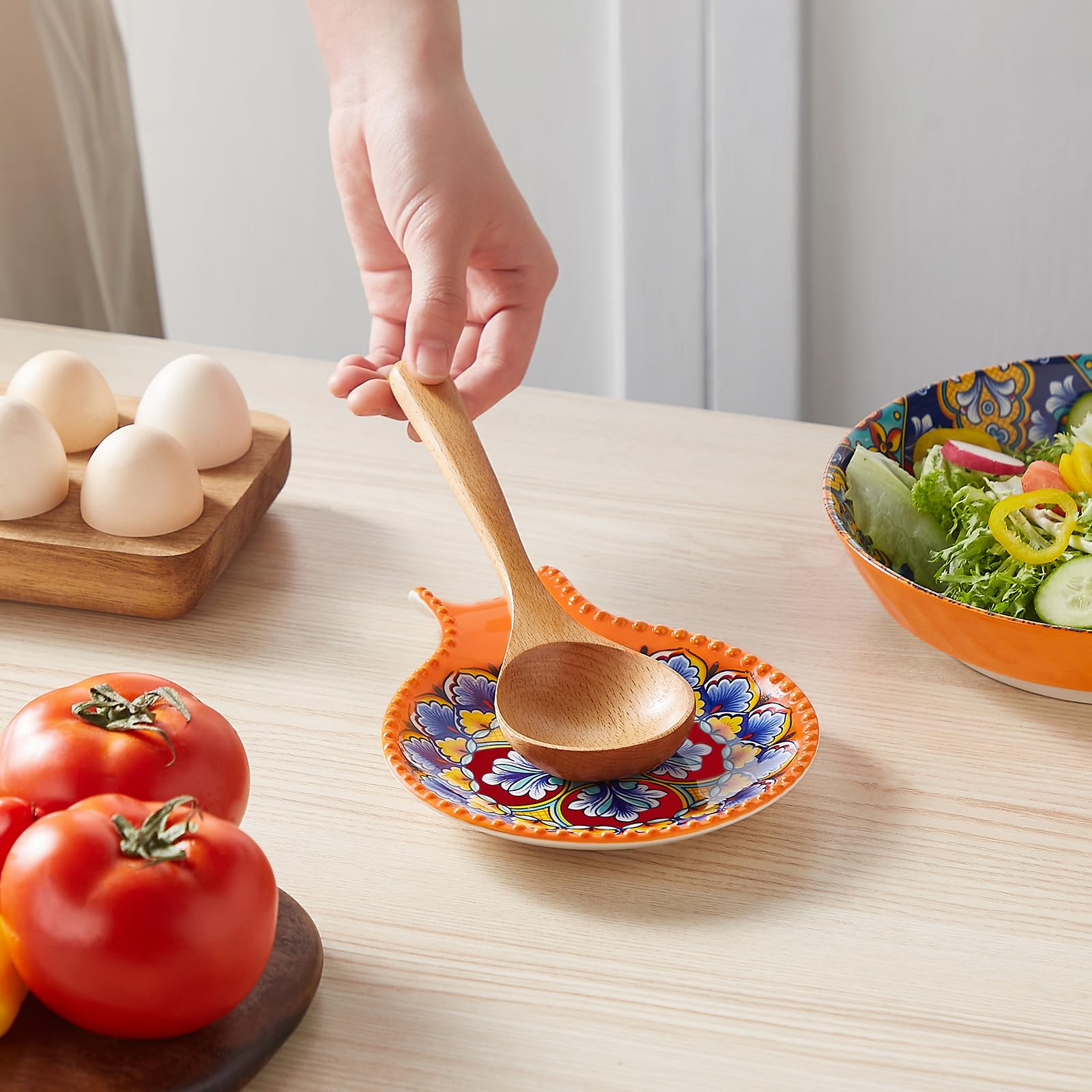 Vancasso orange spoon rest fits on counters during brunch or daily cooking.