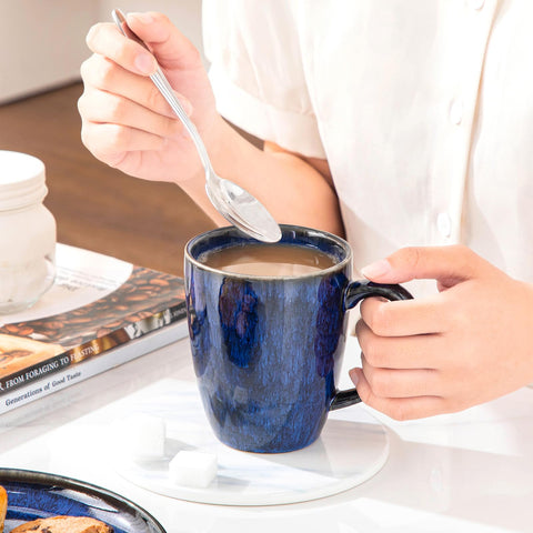 Vancasso Starry minimalist blue mug adds refined table style.