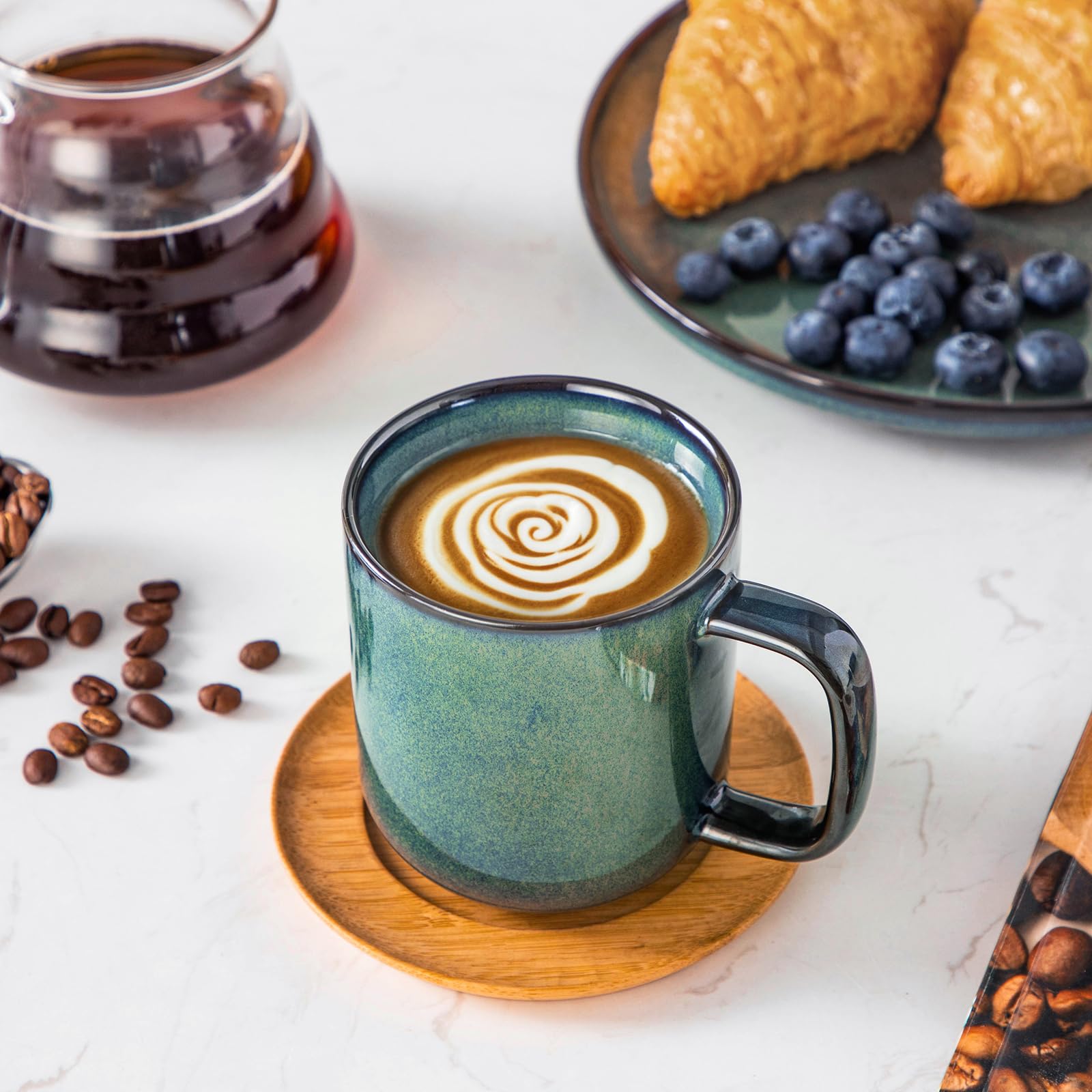 Thick-walled Vancasso Starry mug in green glaze for better heat retention