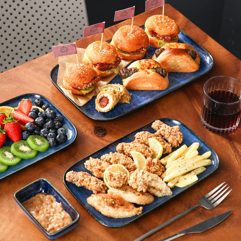 Vancasso Stern platters with cheese and breads elevate entertaining.