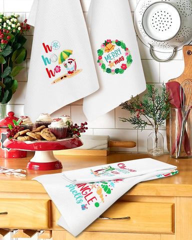 Vansolinne Hawaii-inspired towel shows waves and palm leaves for beachy festive vibes.