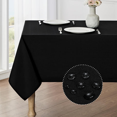 Veblandy rectangle tablecloth with waterproof finish protects a dining table during meals.