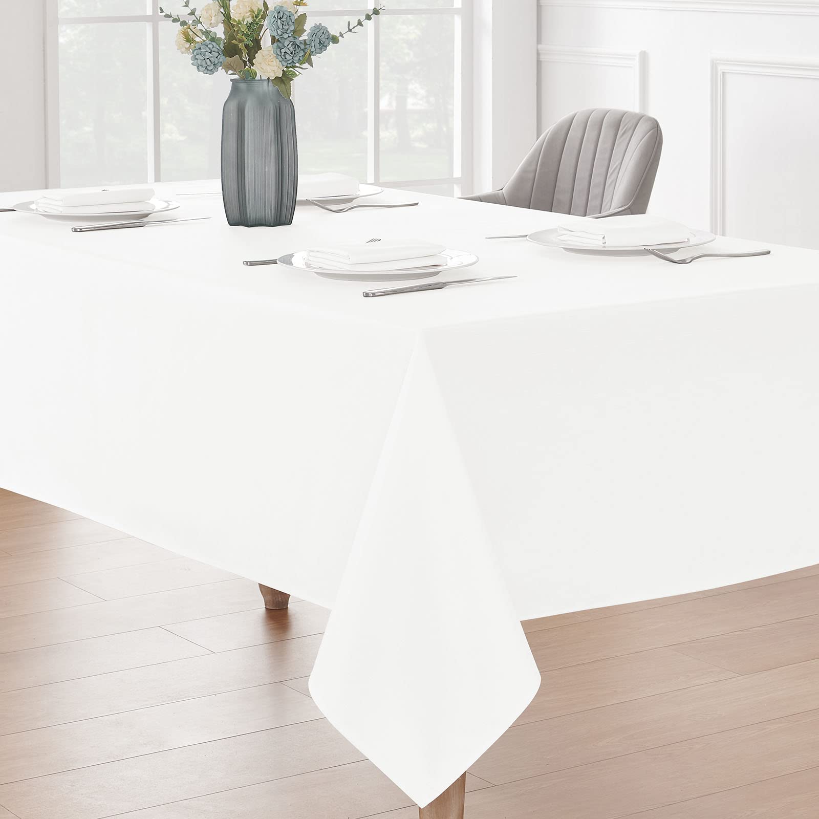 Veblandy white cover protects surfaces during outdoor picnics and camping.