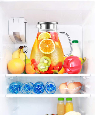 Veecom glass jug serving hot and cold beverages at table