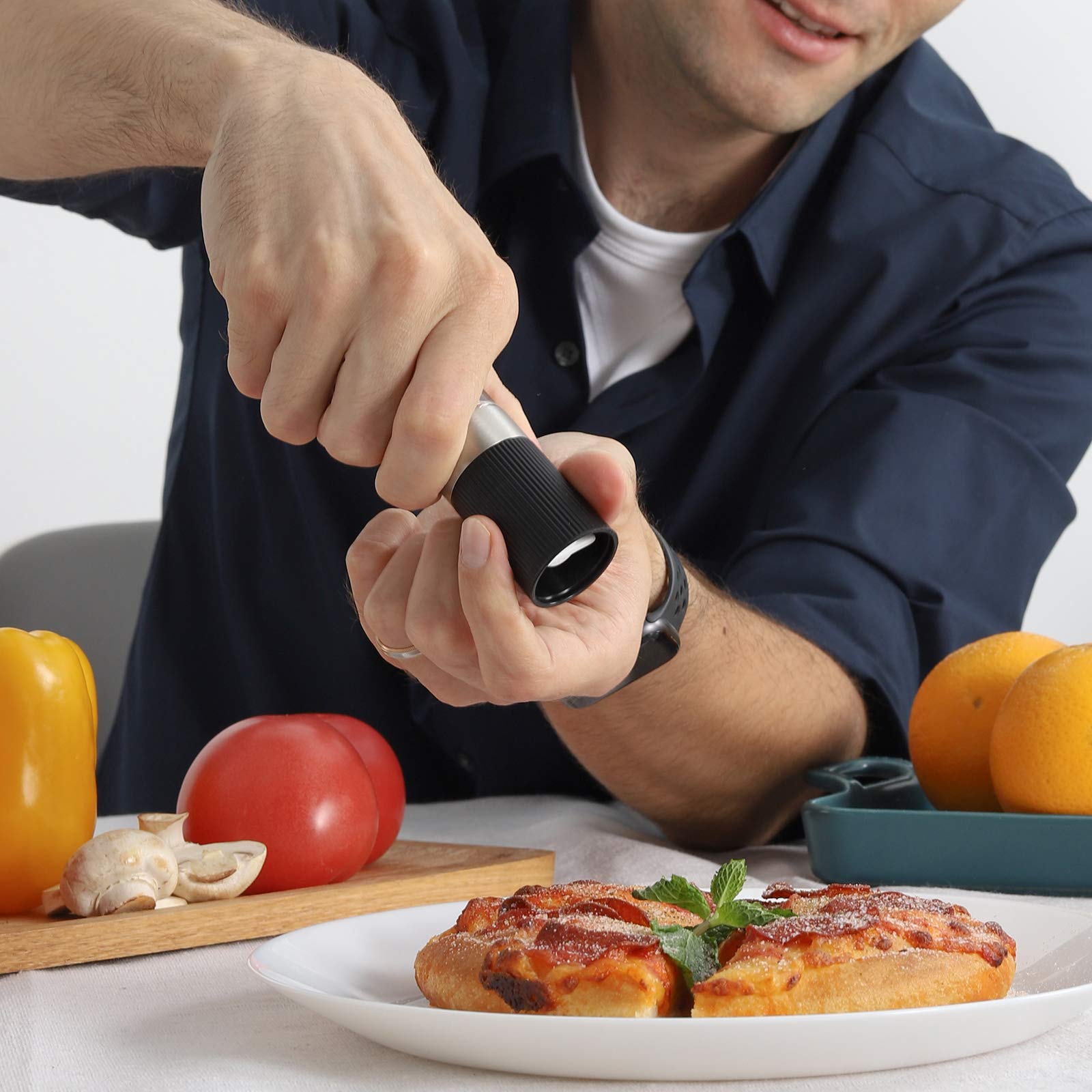 VEVOK CHEF mini grinders showing adjustable coarseness control.
