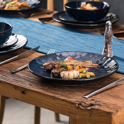 Vicrays blue dinner plate close-up highlights chip-resistant quality.