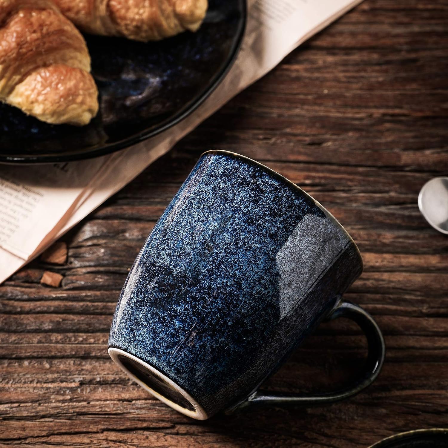 Vicrays porcelain mug with wide handle for comfortable tea or coffee.