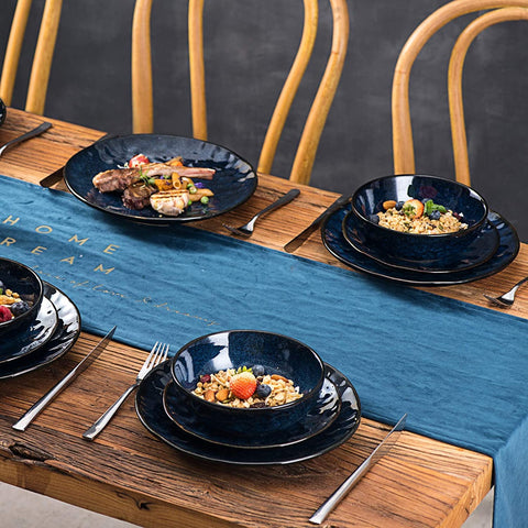 Vicrays blue fluted porcelain plate on dining table for dessert display