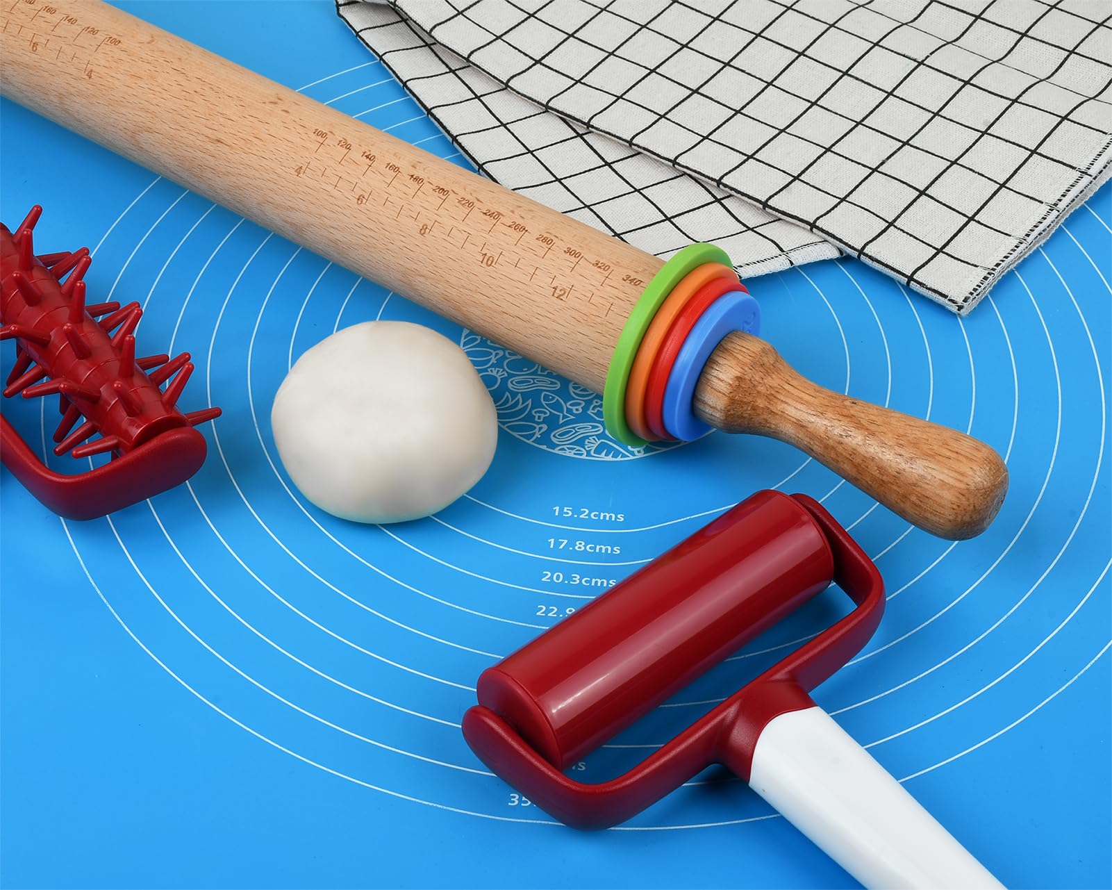 Victhur rolling pin beside recipe book illustrates size and proportion.