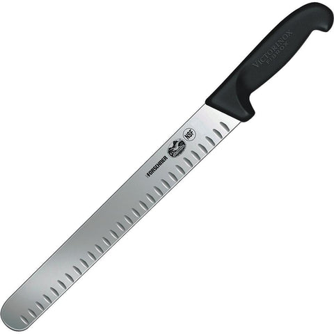 Victorинox Fibrox 12-inch slicing knife with Granton edge close-up highlighting the blade's texture and grip.
