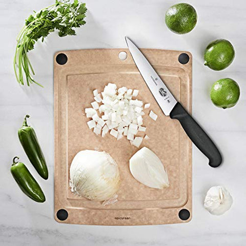 Victorinox Fibrox 6-inch knife slicing vegetables on a board.