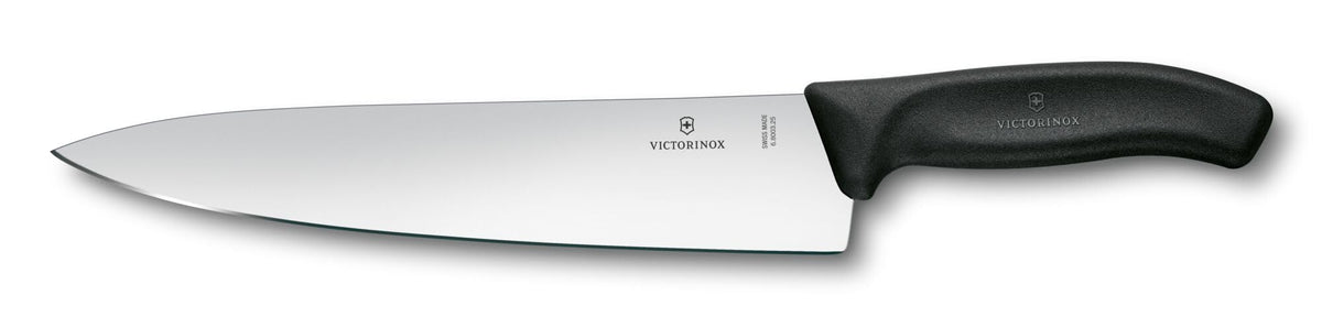 Victorinox Swiss Classic 8-Inch Chef's Knife blade close-up for precise vegetable and meat slicing.