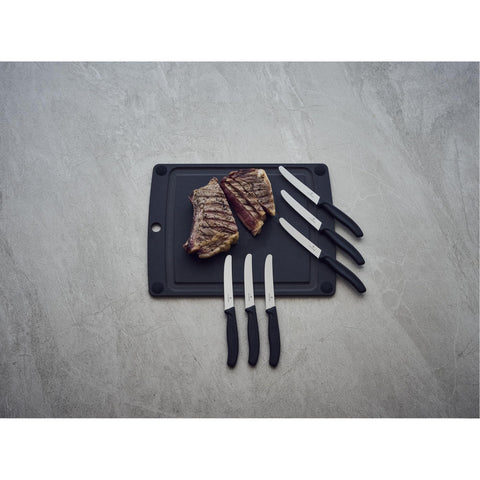 Ergonomic textured handle of Victorinox knife set supports comfortable grip.
