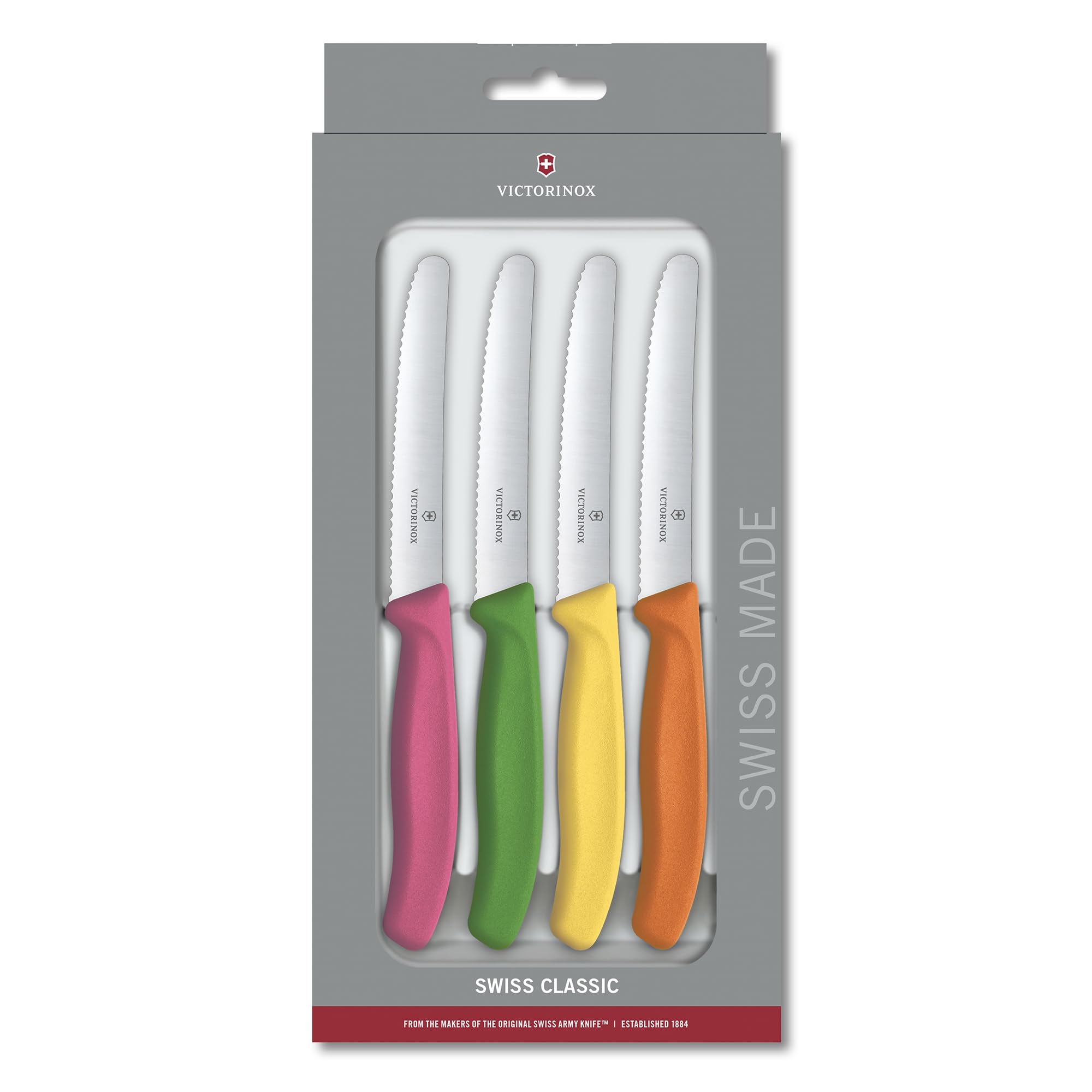Victorinox Swiss Classic paring knife with ergonomic handle provides secure wet-hand grip for peeling and garnishing.
