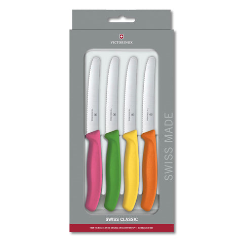 Victorinox Swiss Classic paring knife with ergonomic handle provides secure wet-hand grip for peeling and garnishing.
