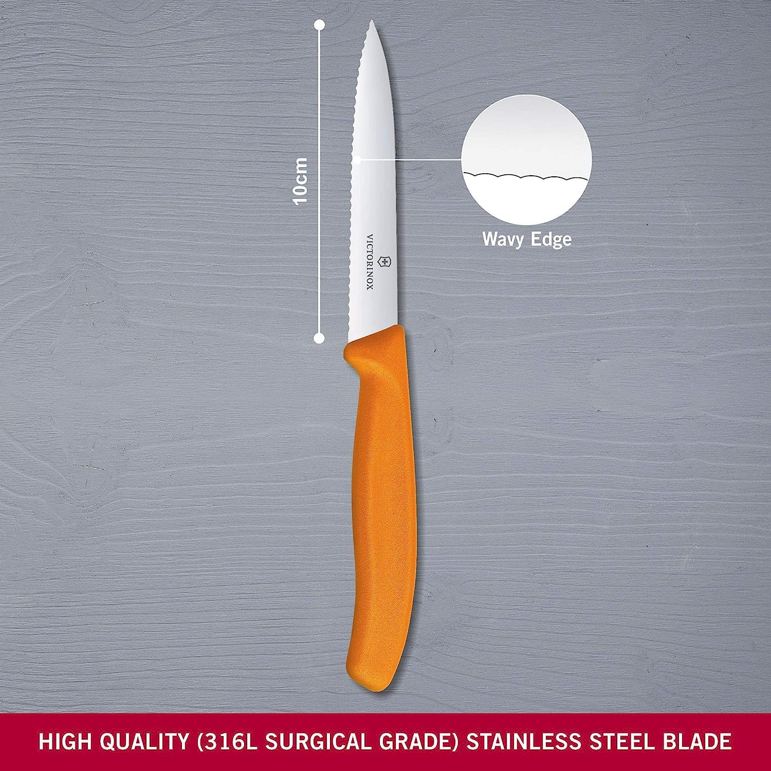 Victorinox Swiss Classic paring knife orange handle highlighting ergonomic grip for precise control