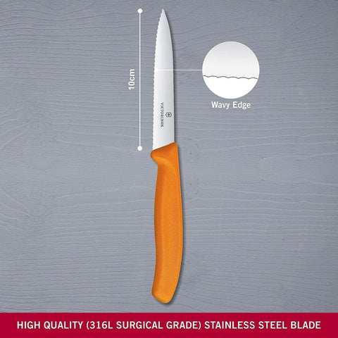 Victorinox Swiss Classic paring knife orange handle highlighting ergonomic grip for precise control