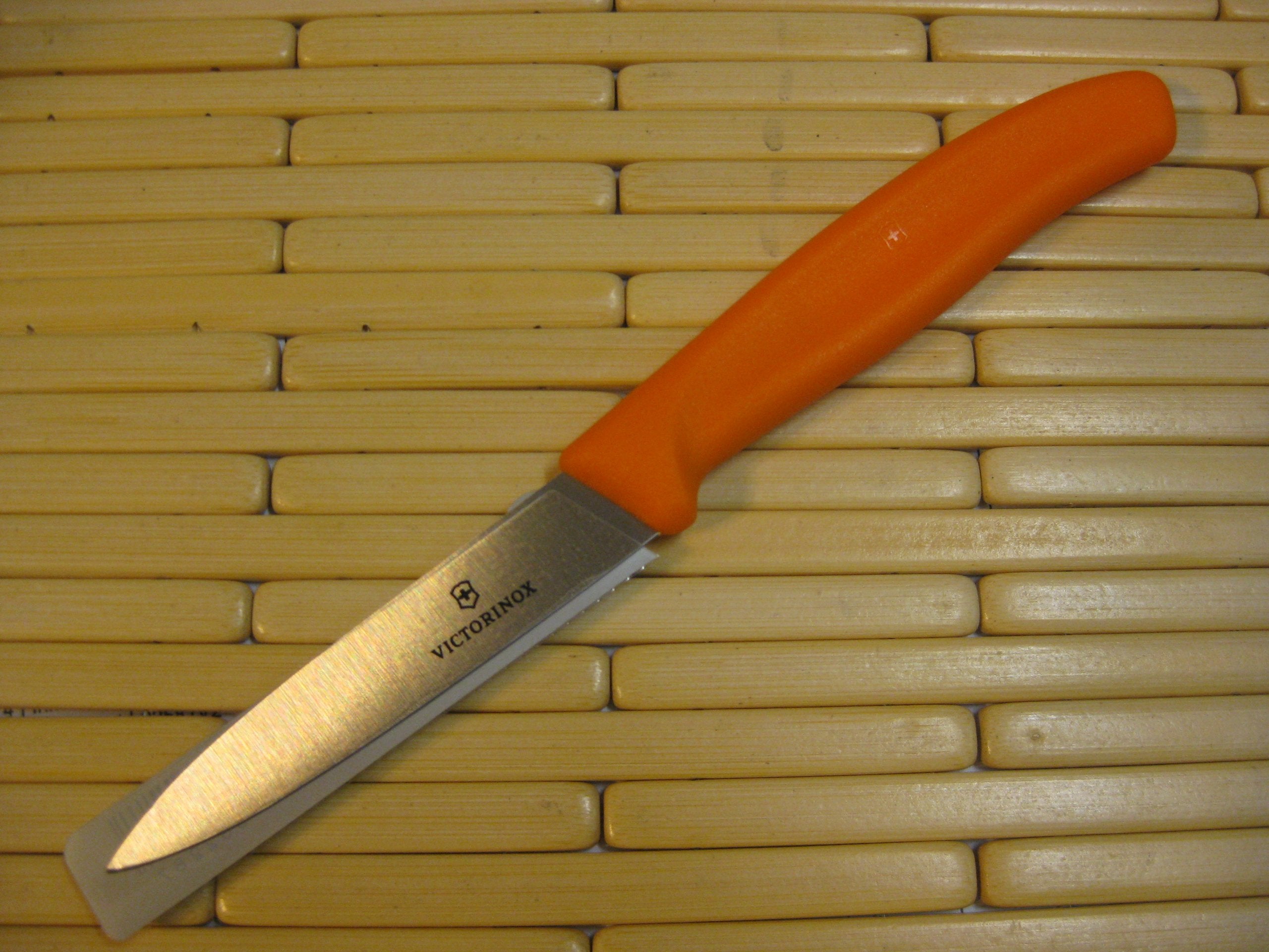Victorinox Swiss Classic paring knife with spear point for precise trimming.