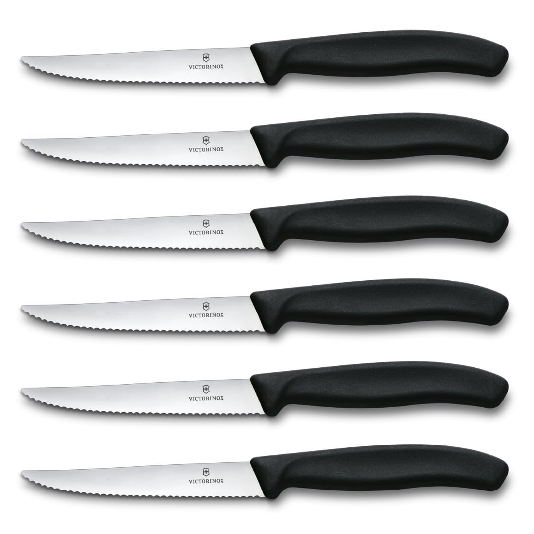 Victorinox Swiss Classic steak knife set with black handles for precise slicing.