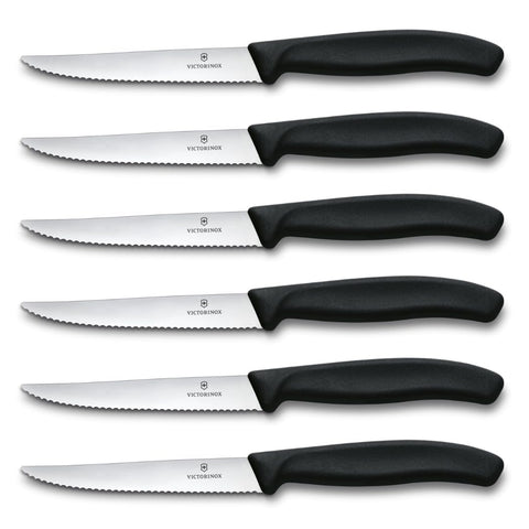 Victorinox Swiss Classic steak knife set with black handles for precise slicing.