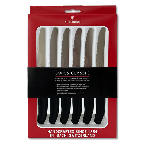 Victorinox Swiss Classic steak knife set on table for precise meat slicing.