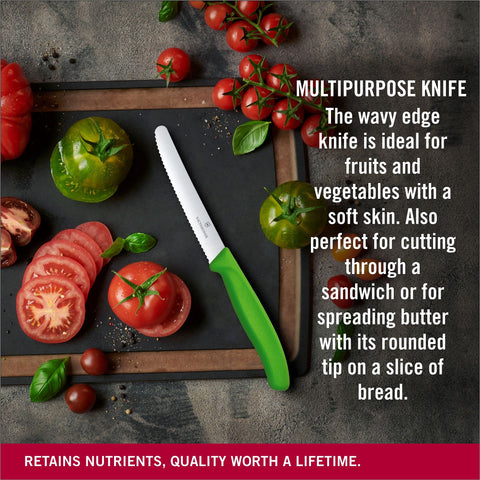 Victorinox Swiss Classic tomato knife green handle holding over ingredients for prep