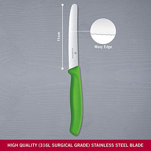 Victorinox Swiss Classic tomato knife with green handle slicing ripe tomatoes evenly