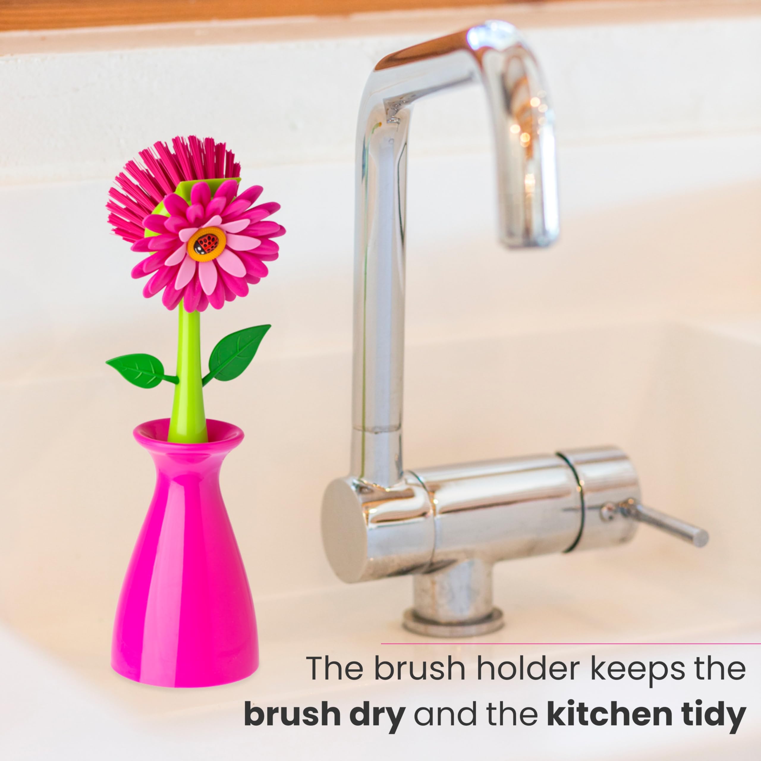 Vigar Flower Power pink and green dish brush in bright kitchen