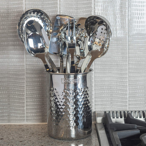 Viking crock with utensils on counter offers quick access during cooking