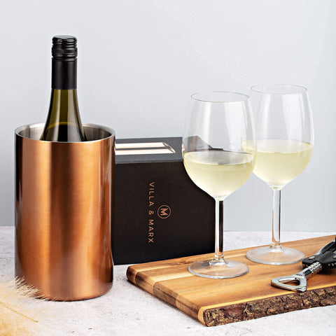 Villa & Marx copper-finish chiller highlights an elegant table presentation.