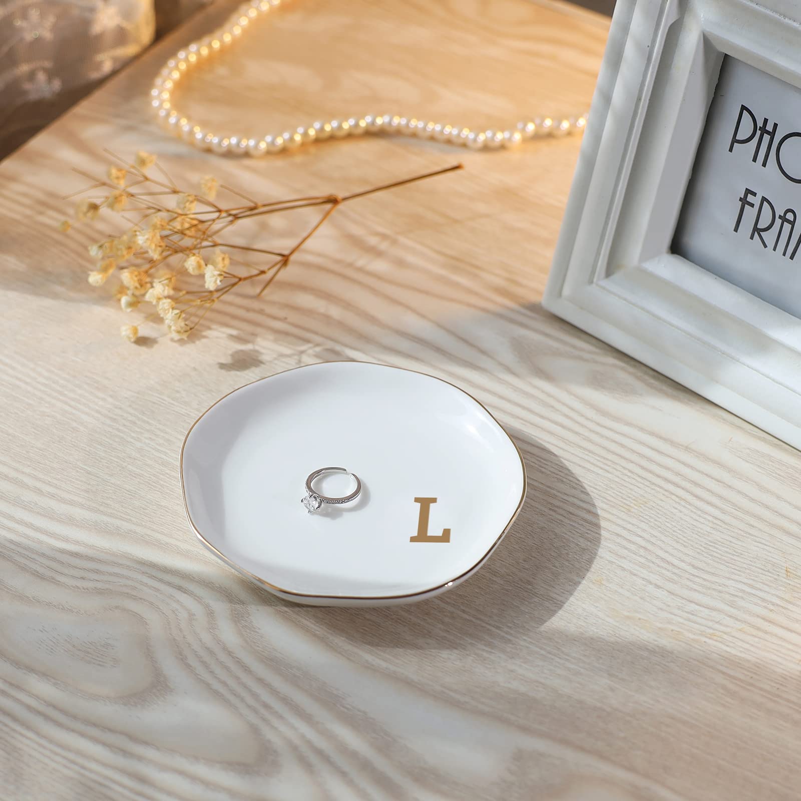 VINCOMIC Initials Ring Dish on nightstand keeps rings organized and within reach.