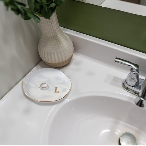 VINCOMIC Initials Ring Dish with assorted jewelry showing versatile storage.