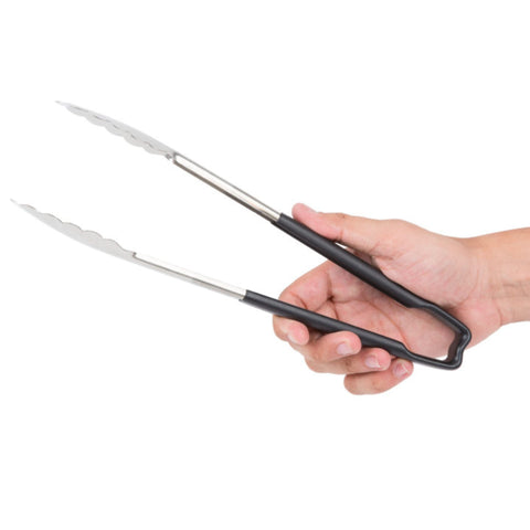 Vollrath pasta tongs in use for sautéed noodles and vegetables