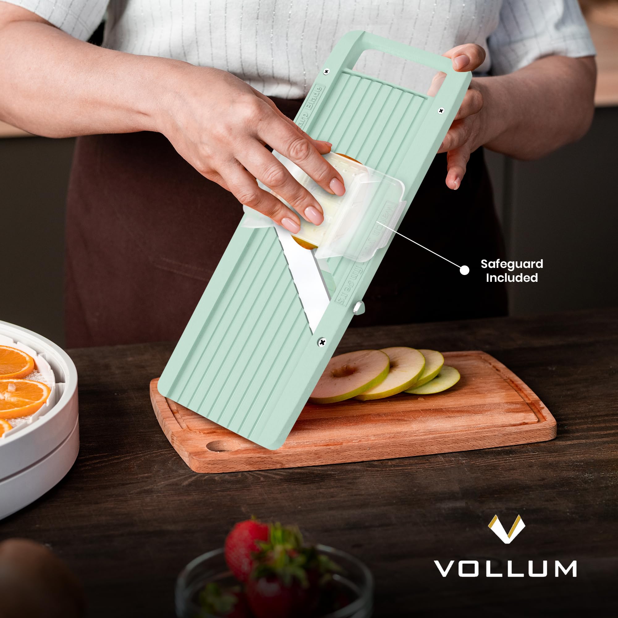 Vollum safety design with finger guard helps protect hands during quick slicing tasks.
