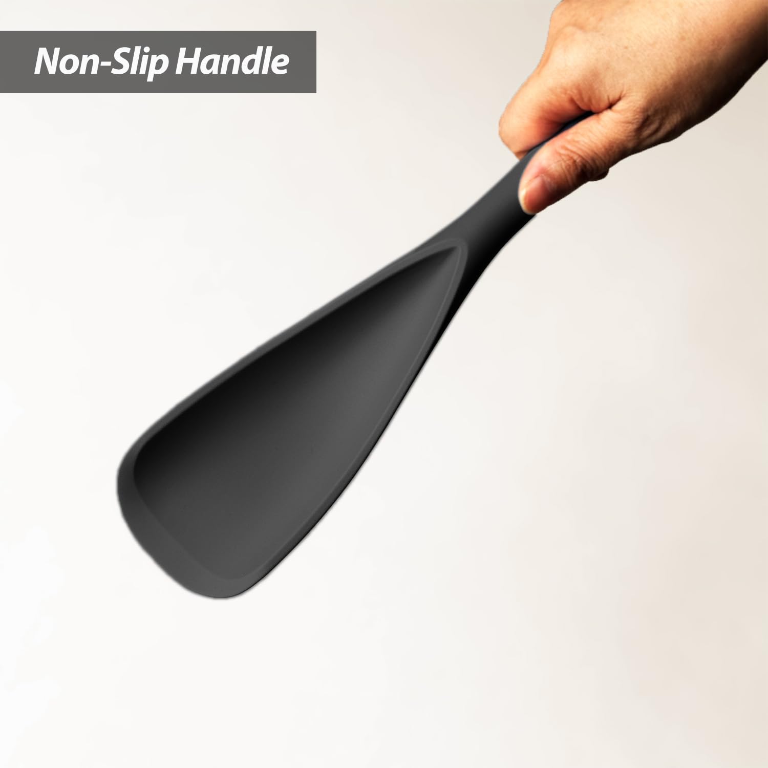 VOVOLY easy-clean spoon in black gliding through batter and sauces