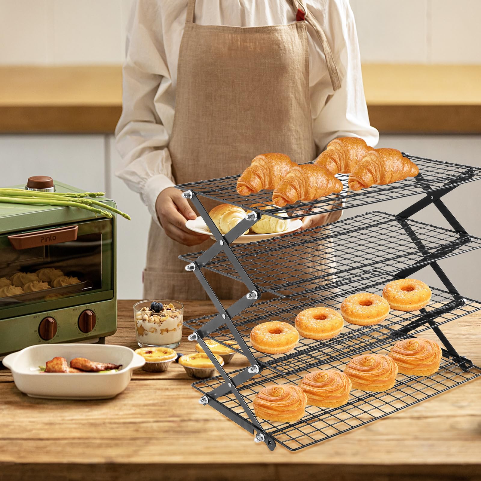 Vrsafan four-tier rack on countertop ideal for drying cookies and bread.