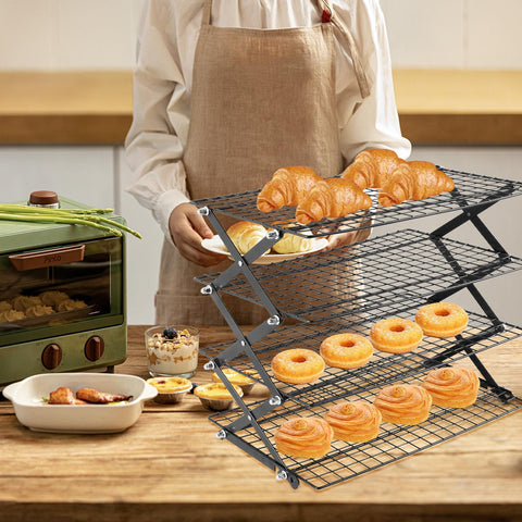 Vrsafan four-tier rack on countertop ideal for drying cookies and bread.