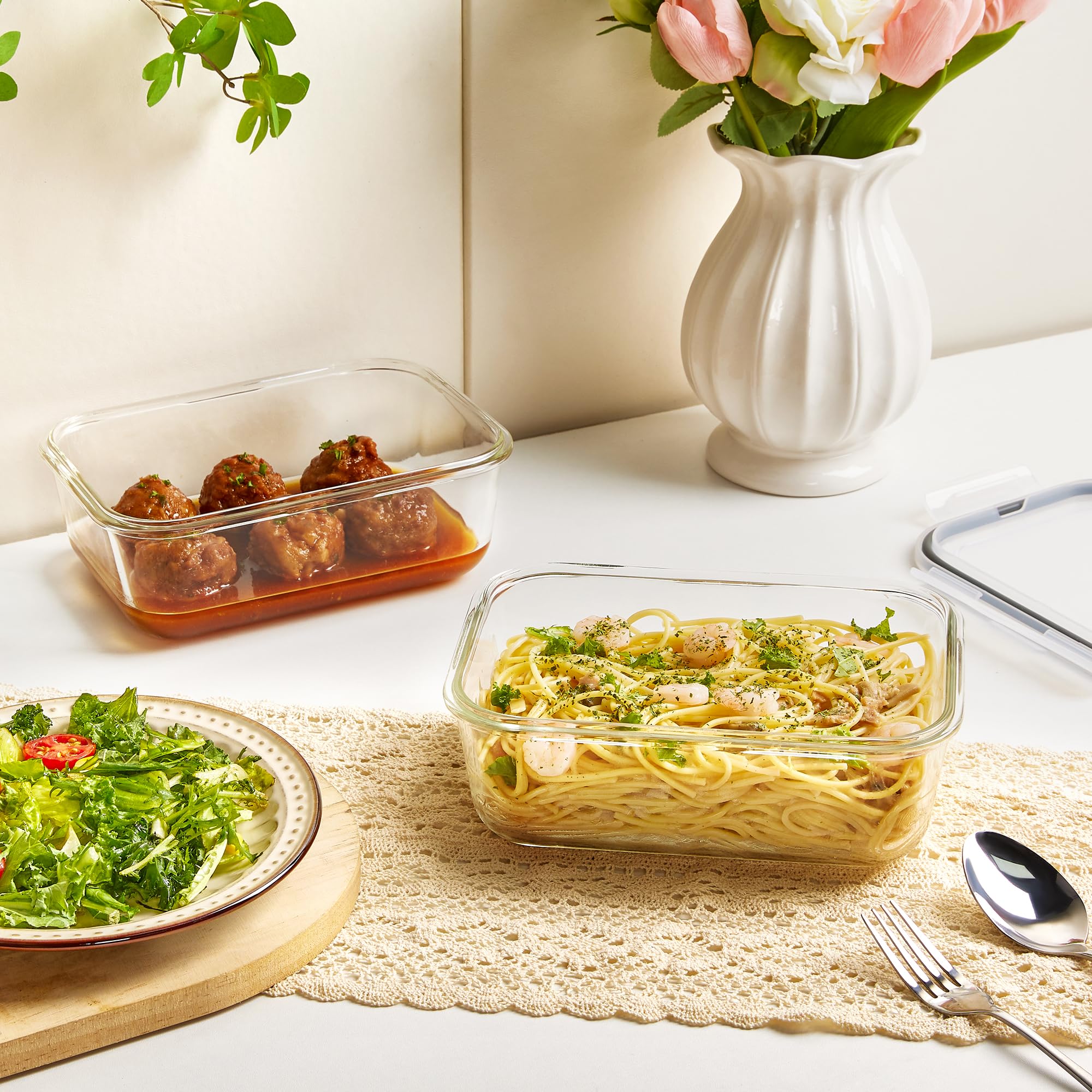 Vtopmart stackable glass containers keep fridge organized and contents clearly visible.