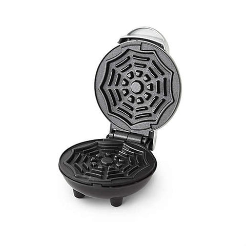 Waffle Maker Dash Spiderweb non-stick surface eases release and cleanup.