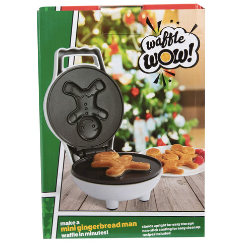 Waffle Wow Gingerbread Man mini waffle maker in use on breakfast table.