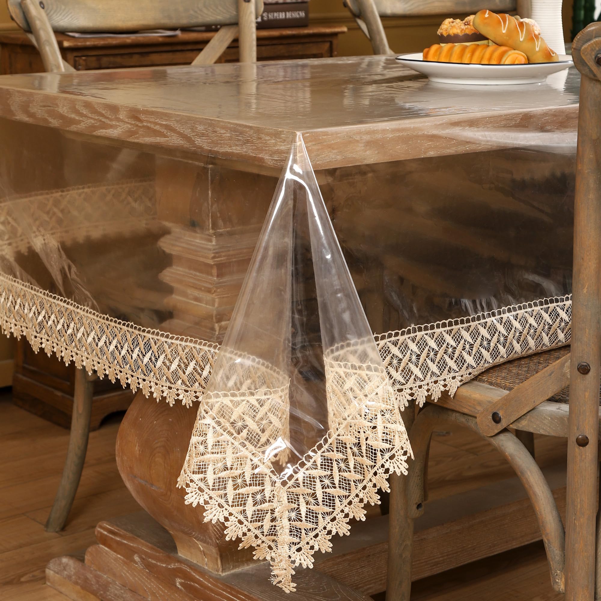 Walrus clear vinyl tablecloth 54x54 protects dining surface from spills.