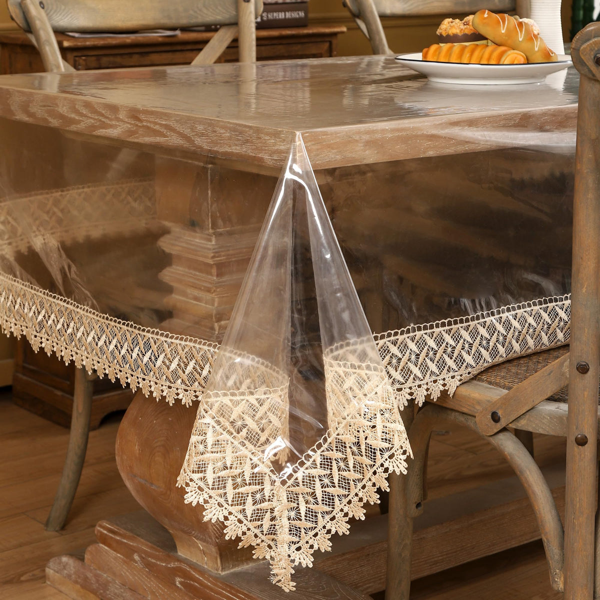 Walrus clear vinyl tablecloth 54x54 protects dining surface from spills.